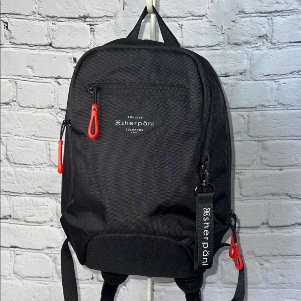 Sherpani Black Backpack with Red Zippers